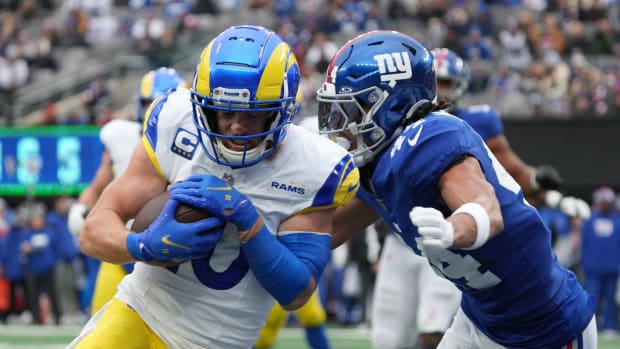 East Rutherford, NJ December 31, 2023 -- Cooper Kupp of the Rams scoring a TD as he can t be stopped by Nick McCloud of the Giants in the first half. The New York Giants host the Los Angelas Rams on December 31, 2023 at at MetLife Stadium in East Rutherford, NJ.
